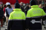 italian cops with uniform with the text POLIZIA LOCALE which mea