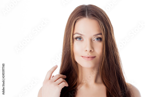 Gorgeous hair. portrait of a beautiful girl with long silky hair. Attractive young woman