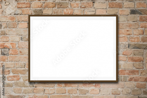 empty picture frame / white canvas mock-up on brick wall 
