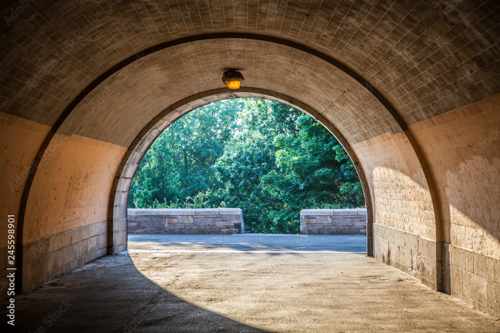 View of underpass in Central Park in New York City during sunny summer daytime