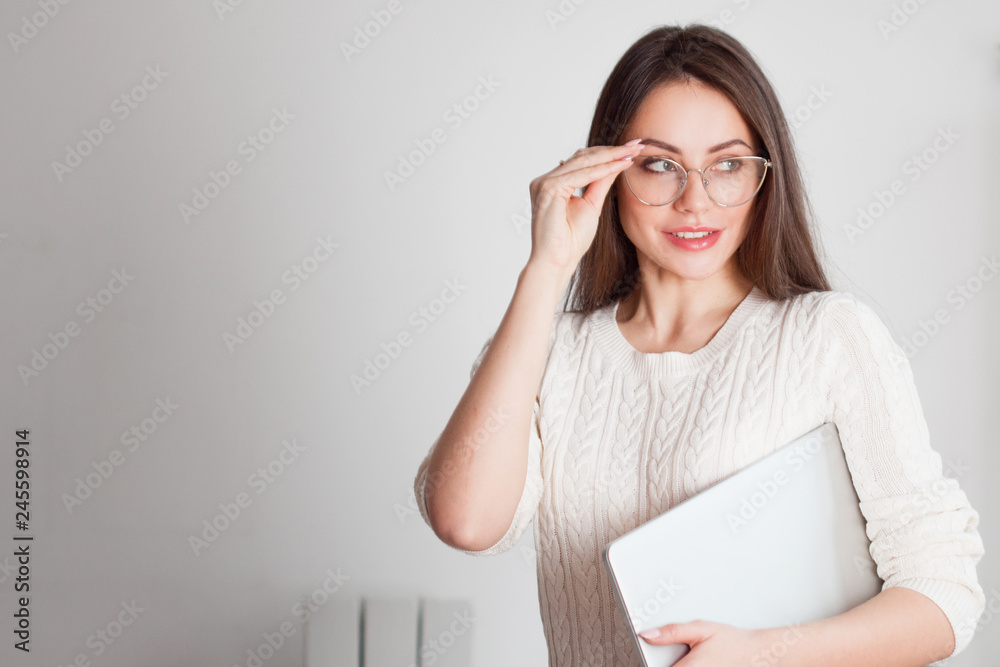 stylish business brunette in glasses with laptop. stylish business brunette in glasses with laptop.