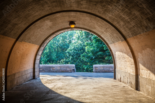 View of underpass in Central Park in New York City during sunny summer daytime photo