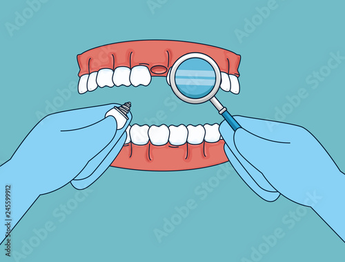 teeth treatment with mouth mirror and prosthesis