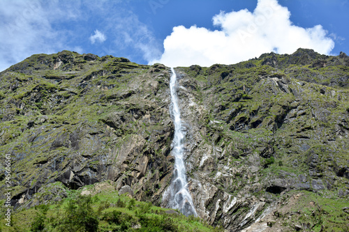 Beautiful view of the waterfall on the way to Amjilosa village. Trek to Kangchenjunga, Great Himalaya Trail, Nepal.
