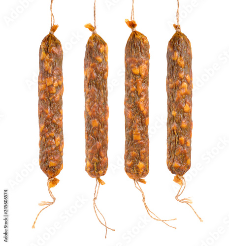Homemade drying sausage. Isolated on white background.