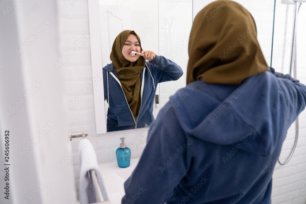 young woman hijab doing routine activities young woman hijab doing routine activities