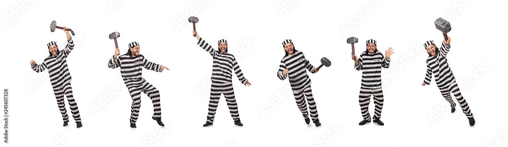 Prison inmate with hammer isolated on white