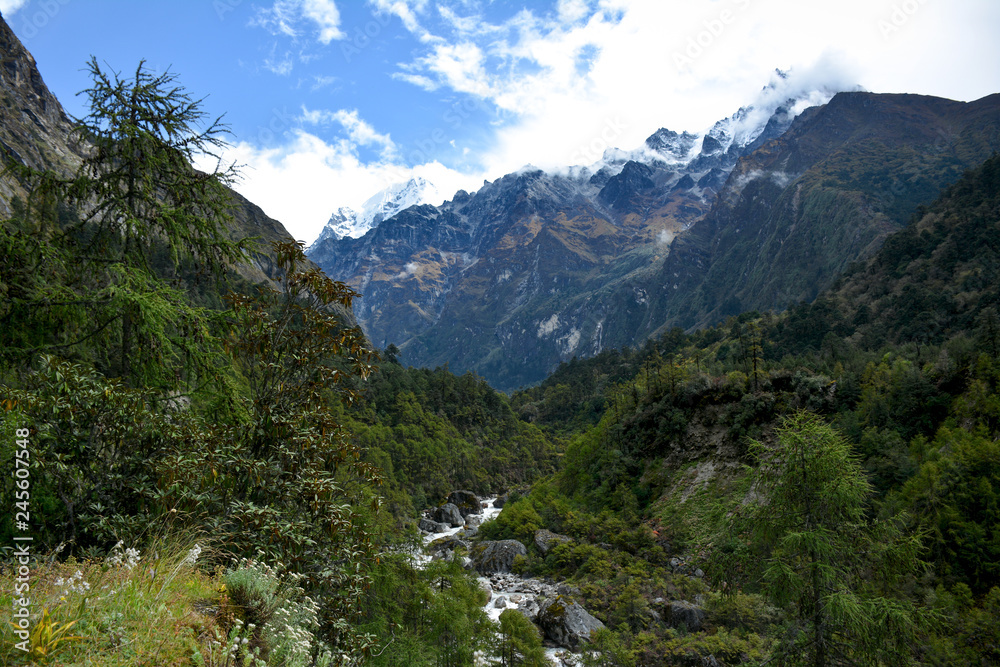 Beautiful of the valley, river and Himalayan Mountains on the way to Ghunsa. Trek to Kangchenjunga basecamp, Nepal