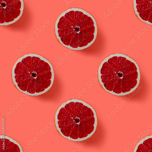 seamless pattern consisting of halved grapefruit