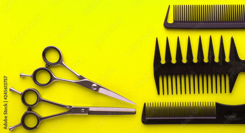 Professional hairdresser tools on colored background Professional hairdresser tools on colored background
