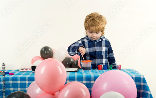 Boy drawing a picture for fathers day. Little child. Creative tasks for children. Children drawing for development.