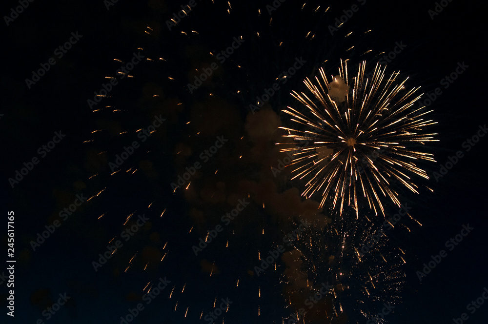 Extremley cheap firework over the city, orange and yellow Extremley cheap firework over the city, orange and yellow