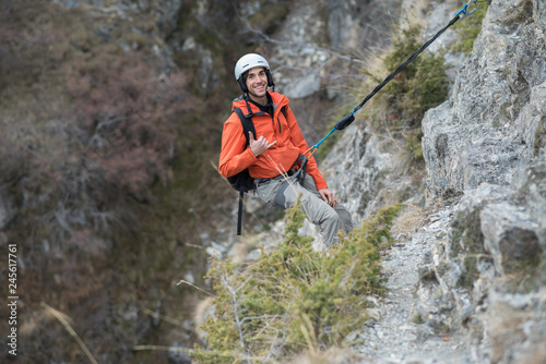 Young man doing a climbing line in Canillo, Andorra.