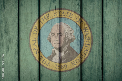 USA Politics News Concept: US State Washington Flag Wooden Fence