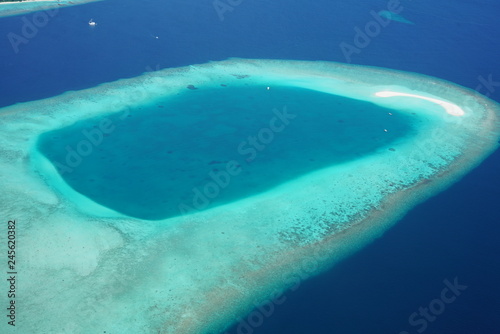Aerial view of a small atoll in the Maldives