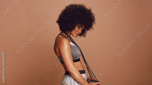 Fitness woman with a jump rope