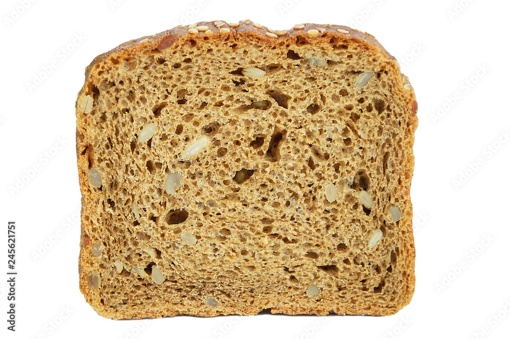 A slice of fresh rye bread with slices of sunflower seeds. White isolate. Close-up.