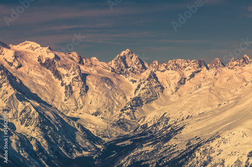 Beautiful landscape showing the beauty of the Caucasus Mountains in the sun at sunset. Toned image