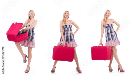 Beautiful woman with suitcase isolated on white 