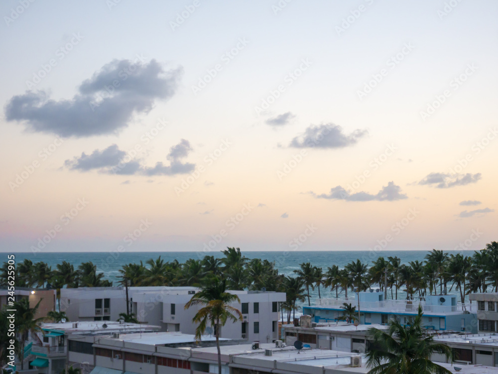 View of Luquillo during the sunrise. Residentail building near the beach.