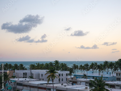 View of Luquillo during the sunrise. Residentail building near the beach. © christian