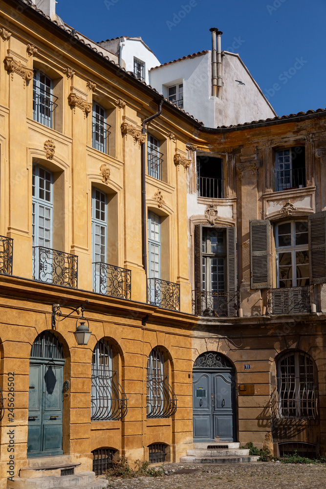 Beautiful weathered apartment buildings in the charming city of Aix-en-Provence