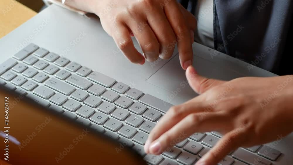 Woman's Hand Typing on Laptop Woman's Hand Typing on Laptop