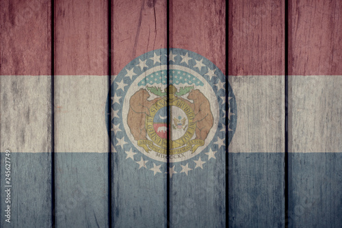USA Politics News Concept: US State Missouri Flag Wooden Fence