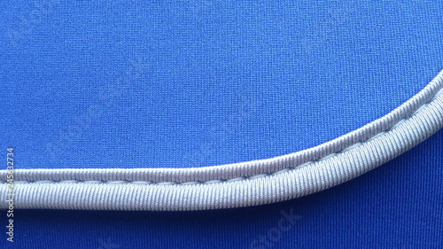 Schilderij op canvas curved seam of a blue neoprene fabric