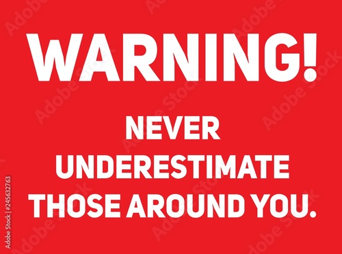Warning never underestimate those around you warning sign