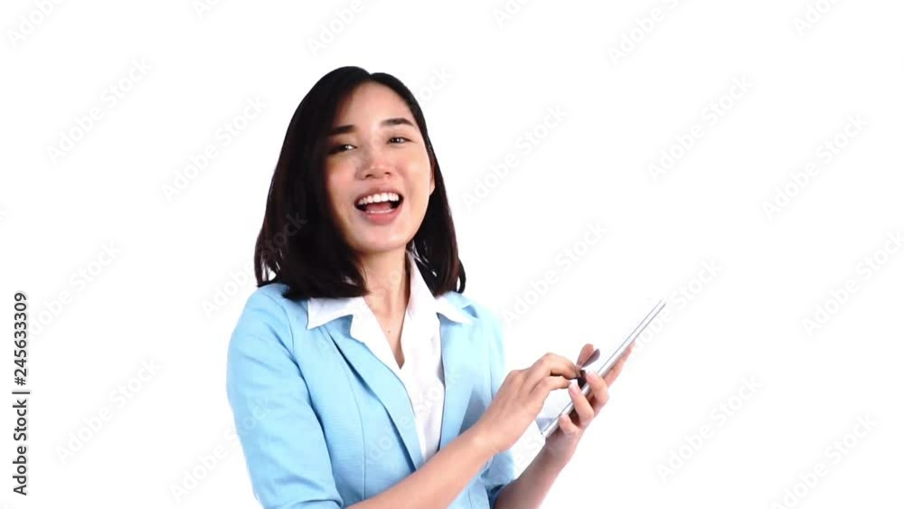 Young business Thai woman use a tablet phone to presentation on white background. Young business Thai woman use a tablet phone to presentation on white background.
