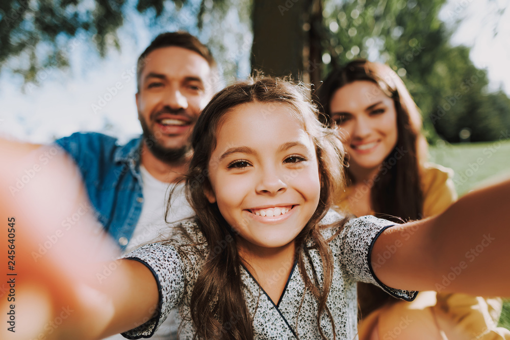 Happy family is spending summer weekend together