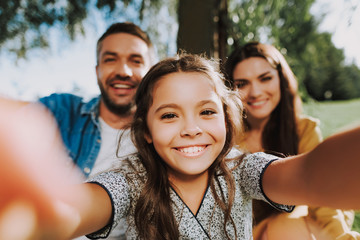 Happy family is spending summer weekend together