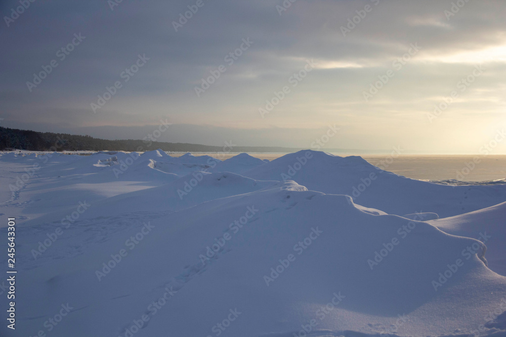 Time Lapse Video of the Winter Sunrise Snow Baltic Beach, Latvia, Saulkrasti. Frozen Sea With Ice Stacks