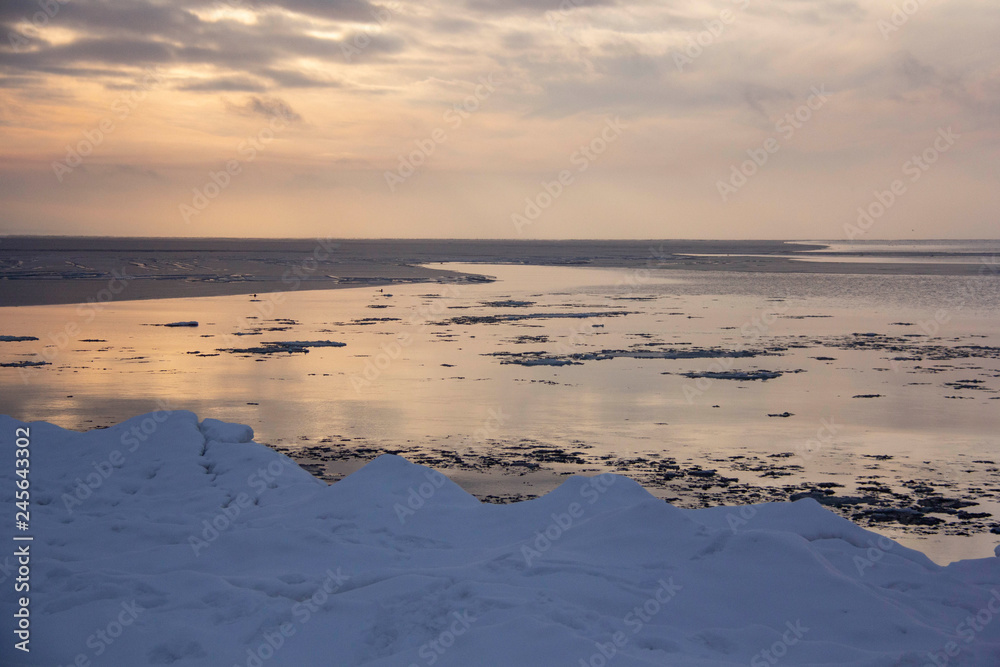 Time Lapse Video of the Winter Sunrise Snow Baltic Beach, Latvia, Saulkrasti. Frozen Sea With Ice Stacks