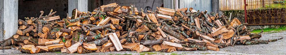 wide view of big pile of mixed firewood