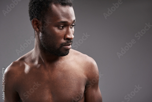 Close up of an afro American man looking aside
