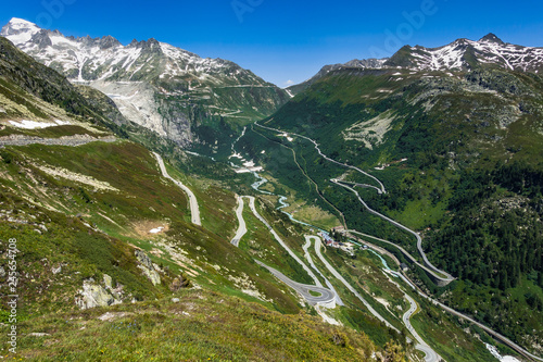 Photos Alpine landscape of Upper Valais: on the foreground the road to Grimsel Pass, on