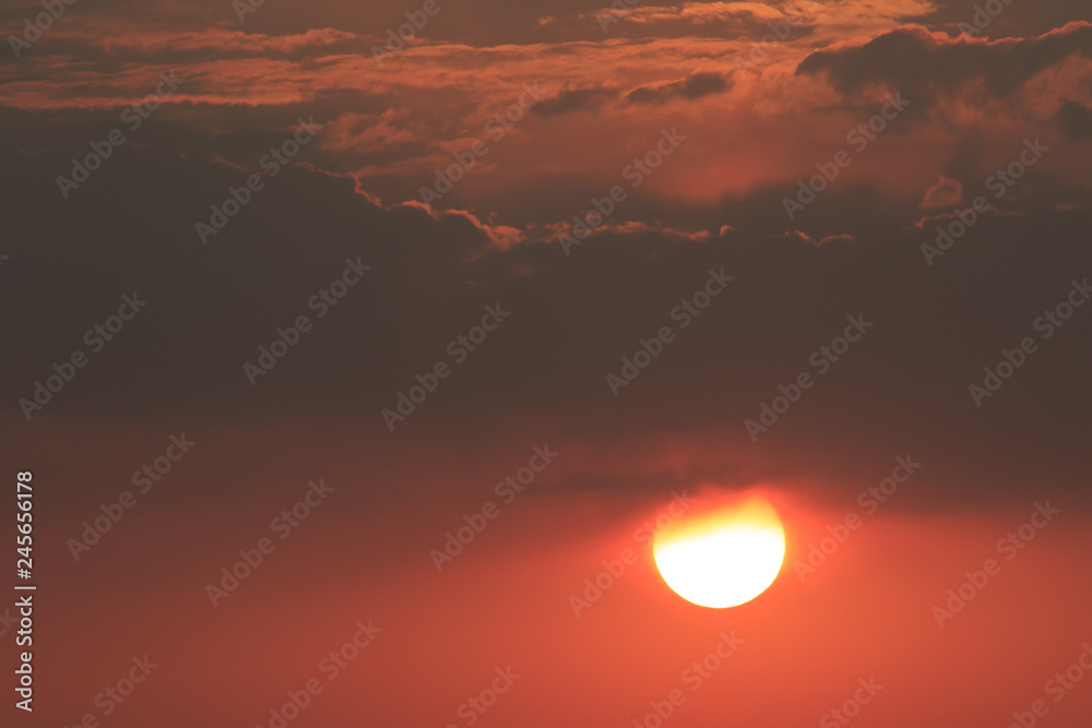Sunset orange and red colors landscape, sea and sun with deep sky background..Red Sea, Egypt, Africa. Evening sunset view with clouds sky. Vacation at summer time. Sunrise morning beauty of nature
