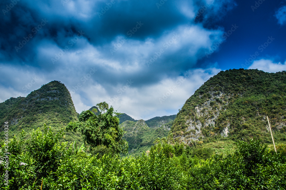 Mountains and rural scenery with blue sky in summer Mountains and rural scenery with blue sky in summer