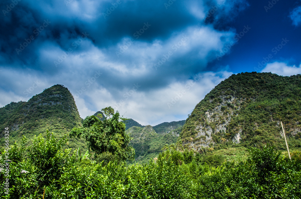 Mountains and rural scenery with blue sky in summer