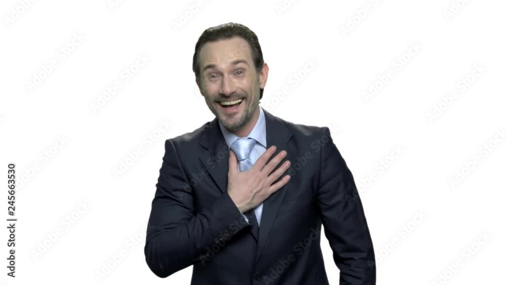 Portrait of laughing executive looking at camera. Successful mature businessman with beard is laughing on white background. Human positive emotions. Portrait of laughing executive looking at camera. Successful mature businessman with beard is laughing on white background. Human positive emotions.