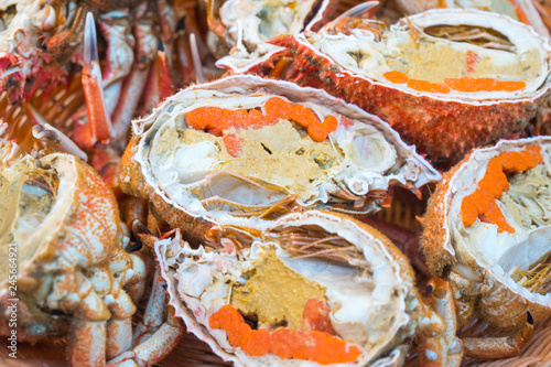 half of fresh crab for sale in a fish market photo