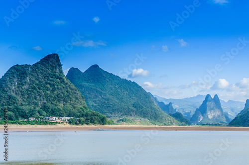 The mountains and river scenery with blue sky  © carl
