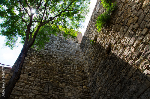 Fortress wall in the city of Girona, view from below photo