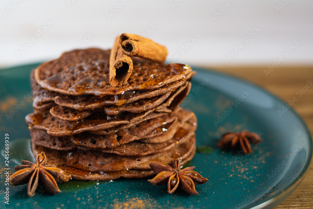 Fototapeta premium Chocolate pancakes with honey