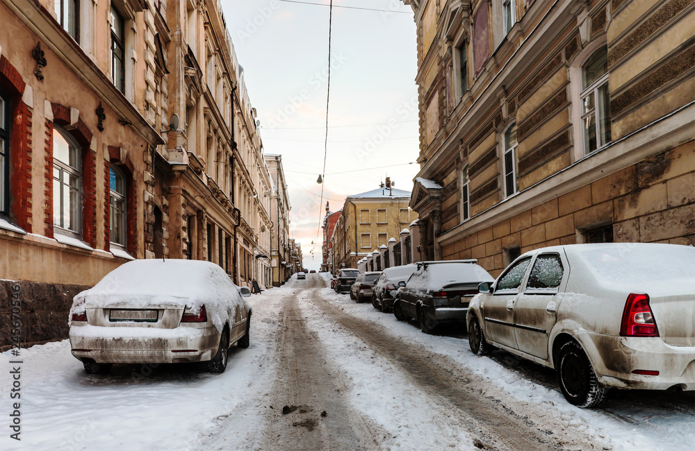 old snow-covered streets of the city. Winter cityscape of the old town old snow-covered streets of the city. Winter cityscape of the old town
