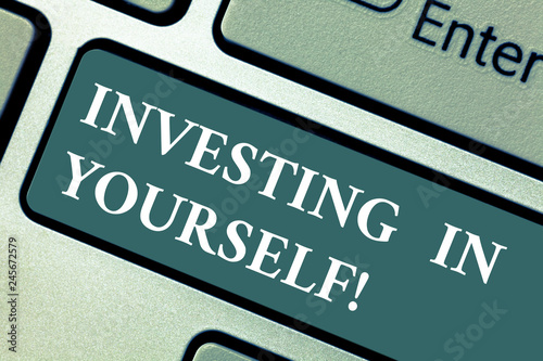 Conceptual hand writing showing Investing In Yourself. Business photo showcasing Learning new skill Developing yourself professionally Keyboard key Intention to create computer message idea