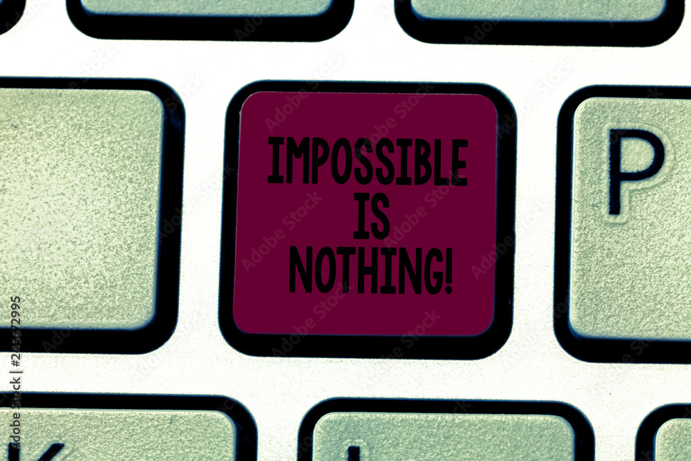 Writing note showing Impossible Is Nothing. Business photo showcasing Something which is very difficult to accomplish Keyboard key Intention to create computer message pressing keypad idea Writing note showing Impossible Is Nothing. Business photo showcasing Something which is very difficult to accomplish Keyboard key Intention to create computer message pressing keypad idea