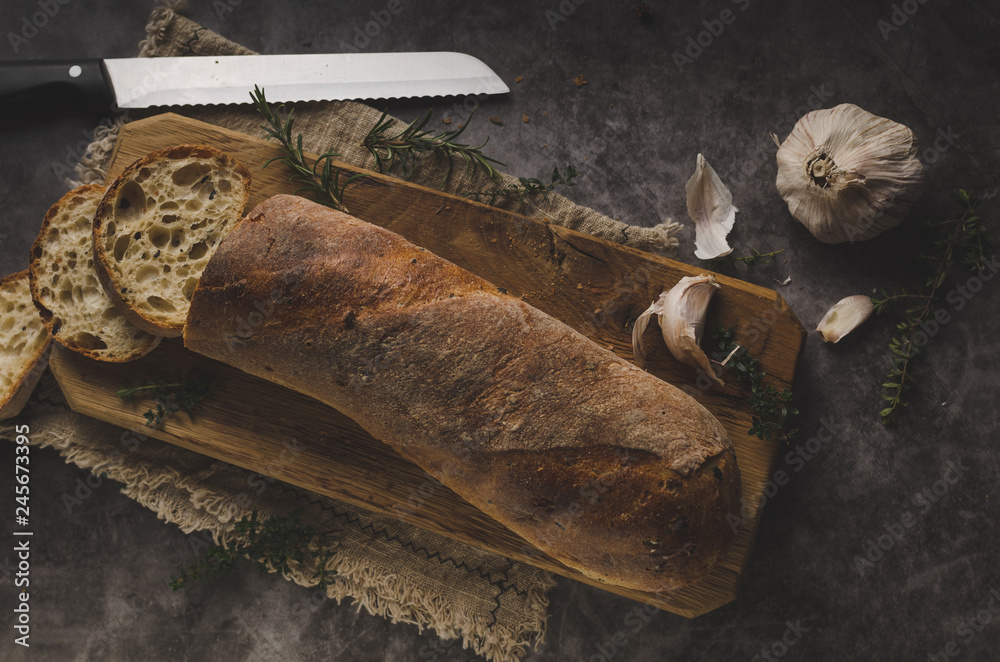 Homemade baguette with herbs